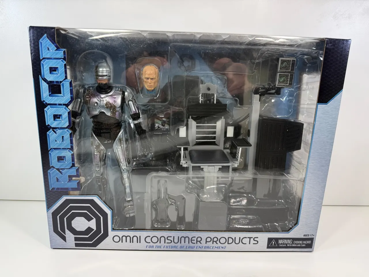 NECA Ultimate 7" Battle‑Damaged RoboCop with Chair Figure - Image 4