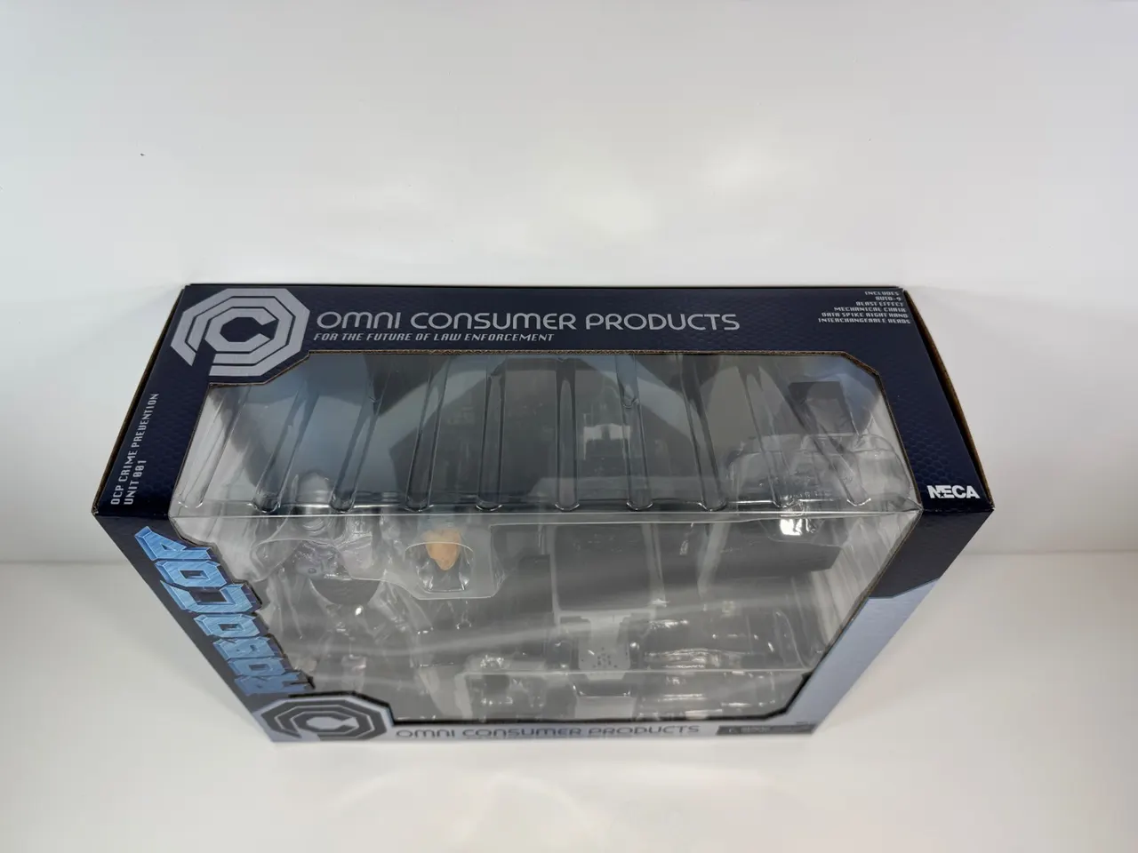 NECA Ultimate 7" Battle‑Damaged RoboCop with Chair Figure - Image 5