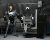 NECA Ultimate 7" Battle‑Damaged RoboCop with Chair Figure - Thumbnail 9